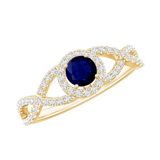 Anillo de compromiso de halo de zafiro azul y diamantes con vástago entrecruzado