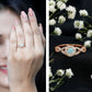 Anillo de compromiso de ópalo etíope natural con diamantes y vástago entrecruzado