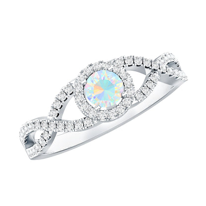 Anillo de compromiso de ópalo etíope natural con diamantes y vástago entrecruzado