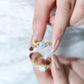 Anillo de compromiso de ópalo etíope natural con diamantes y vástago entrecruzado