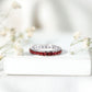Round Created Ruby Full Eternity Ring in Channel Setting