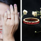 Round Created Ruby Full Eternity Ring in Channel Setting