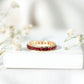 Round Created Ruby Full Eternity Ring in Channel Setting