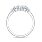 Anillo de promesa de racimo de moissanita redonda y con forma de pera