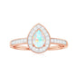 Natural 0.7 Carat Opalescent Teardrop Engagement Ring with Diamond Halo
