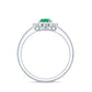 Natural 0.7 Carat Emerald Oval Engagement Ring with Diamond Halo