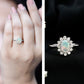 Anillo de compromiso ovalado de ópalo etíope auténtico certificado con halo de diamantes