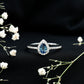 Natural Half Carat Blue Sapphire Teardrop Engagement Ring with Diamond Halo