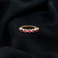 Minimal Created Ruby Half Eternity Ring in Bezel Setting