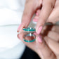 Channel Set Princess Cut Emerald Eternity Band Ring