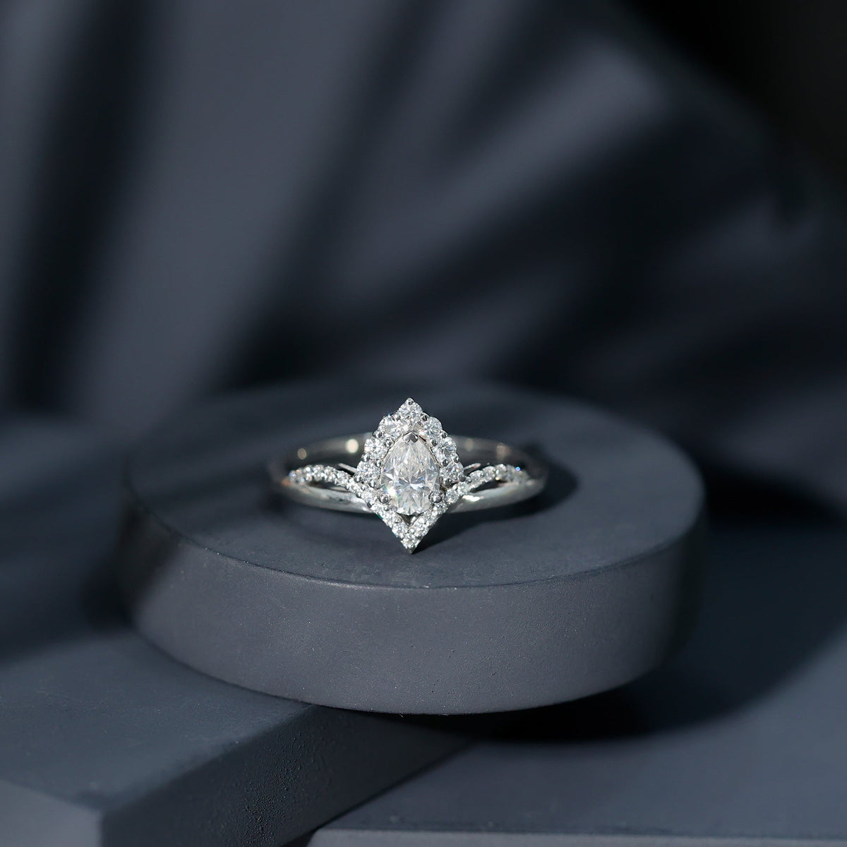 Designer 0.79 Carat Pear Shaped Moissanite Engagement Ring