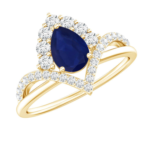 Anillo solitario de diseñador con zafiro azul talla pera y diamante