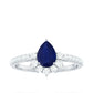 0.5 Carat Pear Shaped Blue Sapphire and Diamond Half Halo Engagement Ring