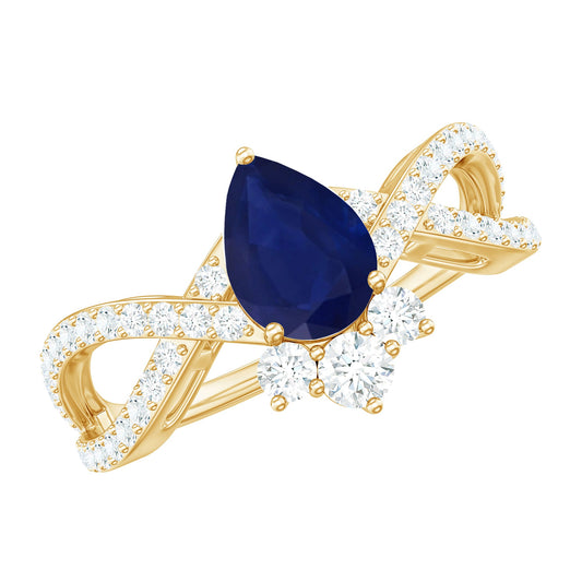 Anillo de compromiso de zafiro azul con forma de pera y cruce de diamantes auténticos de 0.5 quilates