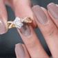 Designer Pear Shaped Moissanite Crossover Engagement Ring