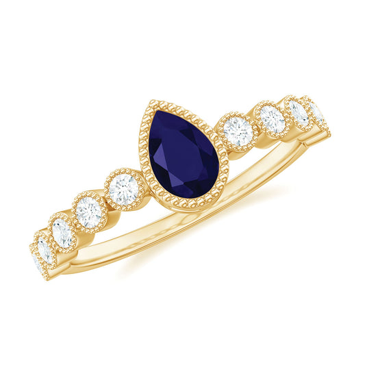Anillo de compromiso de zafiro azul talla pera de 0,5 quilates con diamantes