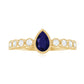 Pear Cut 0.5 Carat Blue Sapphire Engagement Ring with Diamonds