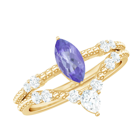 Juego de anillos de compromiso de tanzanita marquesa natural con diamantes