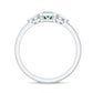 Anillo de oro de 18k con esmeralda y diamante de 0,6 quilates