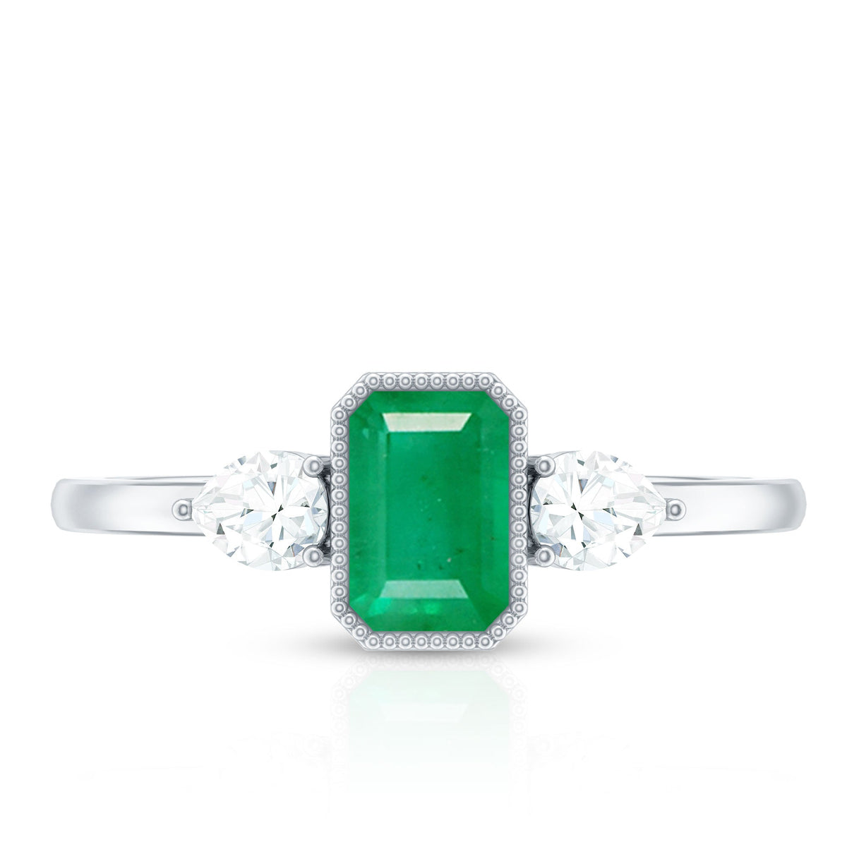 Anillo de oro de 18k con esmeralda y diamante de 0,6 quilates