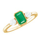 Anillo de oro de 18k con esmeralda y diamante de 0,6 quilates