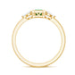 Anillo de oro de 18k con esmeralda y diamante de 0,6 quilates