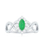 Anillo de compromiso de oro con halo de diamantes y esmeralda marquesa natural con vástago cruzado
