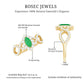 Anillo de compromiso de oro con halo de diamantes y esmeralda marquesa natural con vástago cruzado