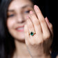 Vintage Looking Emerald Oval Engagement Ring with Diamond Halo