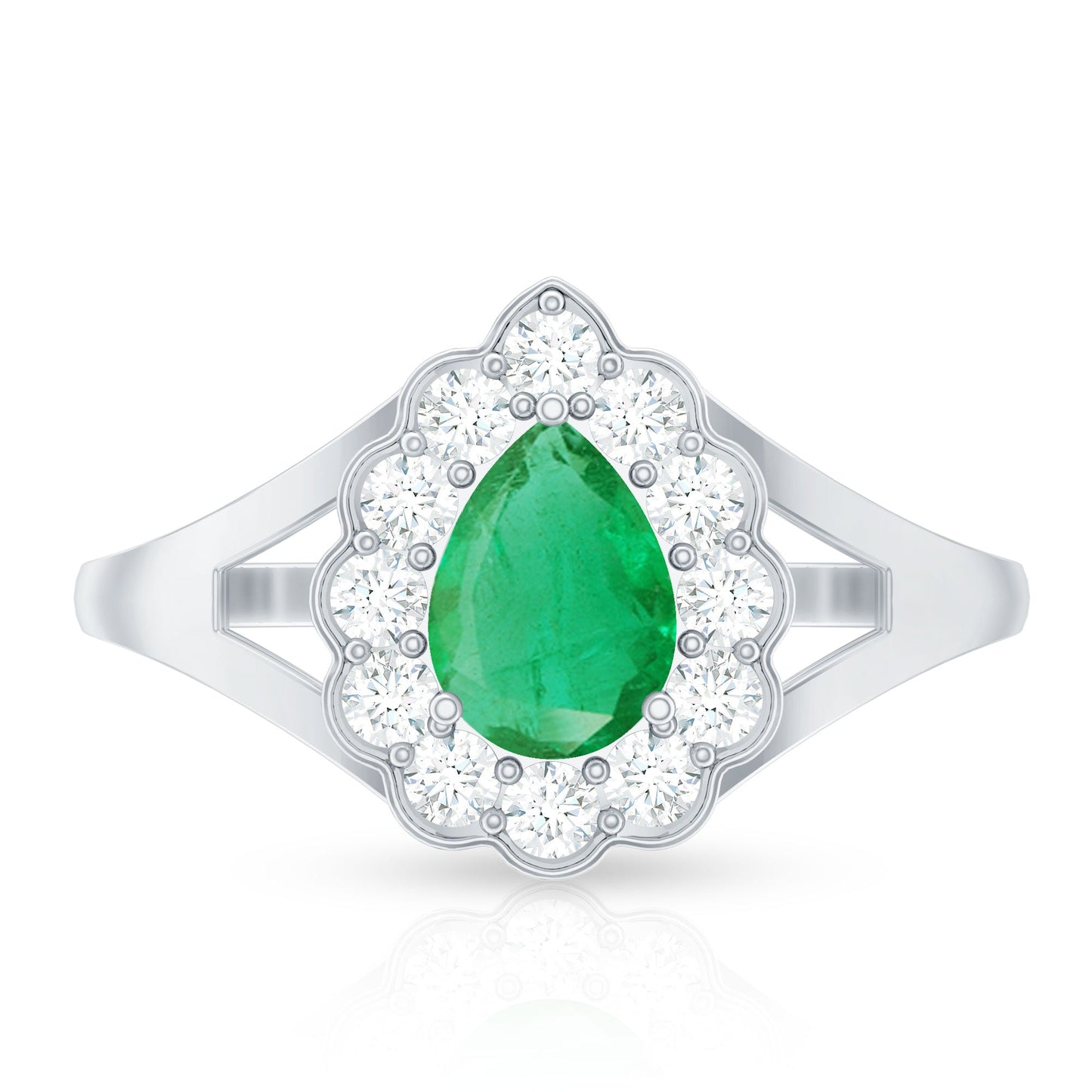 Anillo de compromiso de esmeralda talla pera de 0,6 quilates con halo de diamantes