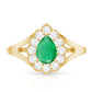 Anillo de compromiso de esmeralda talla pera de 0,6 quilates con halo de diamantes