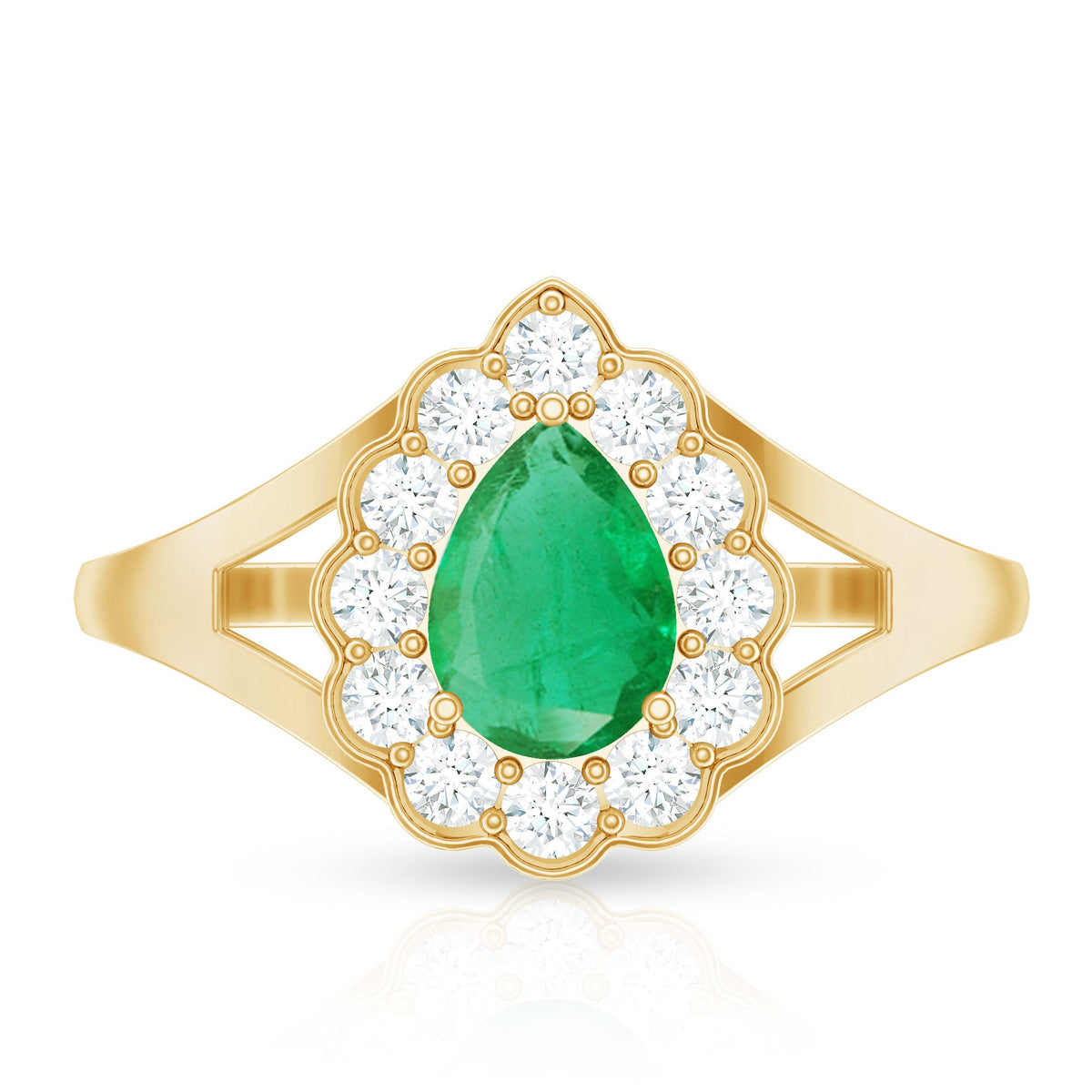 Anillo de compromiso de esmeralda talla pera de 0,6 quilates con halo de diamantes