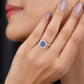 Anillo de compromiso de tanzanita en forma de pera auténtica con halo de diamantes