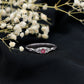 Anillo de promesa con nudo celta y rubí auténtico de talla princesa