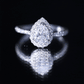 Anillo de compromiso para mujer de moissanita talla pera con halo