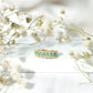 Baguette Emerald and Diamond Braided Half Eternity Band Ring