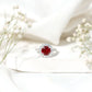 Round Lab Created Ruby and Moissanite Halo Engagement Ring