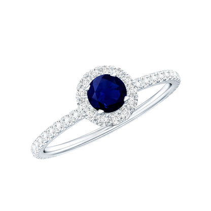 Anillo de compromiso minimalista con zafiro azul de 0,9 quilates y halo de diamantes