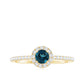 Anillo de compromiso minimalista con topacio azul de talla redonda y diamantes