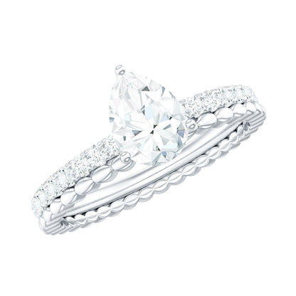 Anillo de compromiso solitario de moissanita con corte de pera de 0,7 quilates