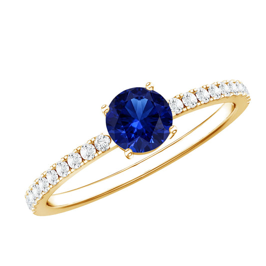 Anillo de promesa de zafiro azul creado en laboratorio de 0,6 quilates con piedras laterales de diamante