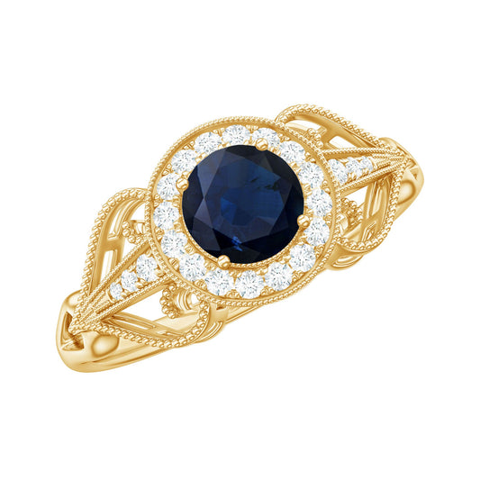 Anillo de compromiso de zafiro azul con halo de diamantes de estilo vintage