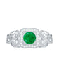 Vintage Looking Emerald Engagement Ring with Diamond Halo
