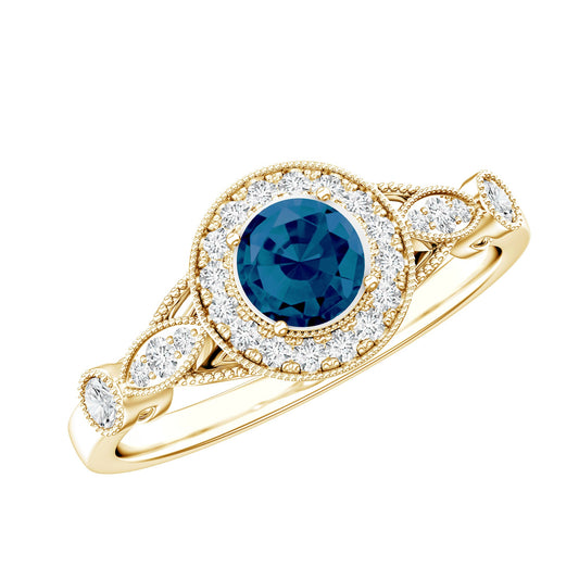 Anillo de compromiso antiguo de topacio azul de Londres de 0,6 quilates con halo de diamantes