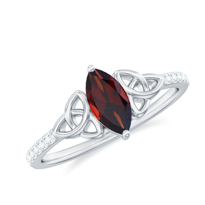 Anillo de compromiso de oro con granate auténtico, diamante marquesa y nudo celta