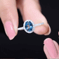1 Carat Oval Cut London Blue Topaz Classic Engagement Ring with Diamond Halo