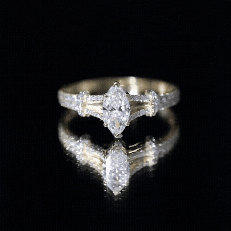 Anillo de compromiso solitario de moissanita talla marquesa en vástago dividido
