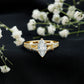 Anillo de compromiso solitario de moissanita talla marquesa en vástago dividido