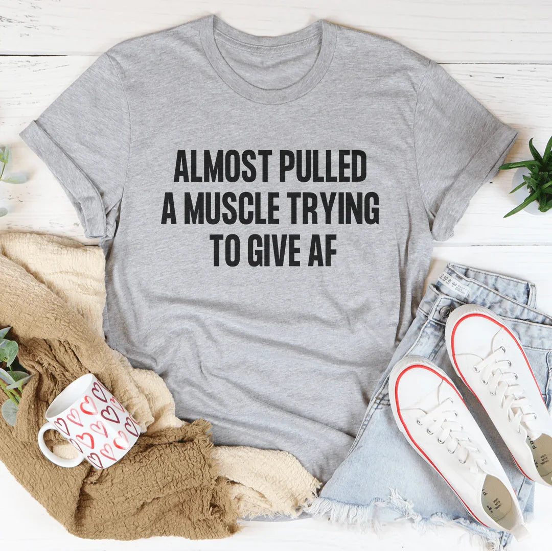 Relatable Effort Humor Crewneck Tee – "Almost Pulled A Muscle Trying To Give AF"
