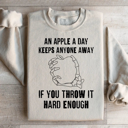 Una manzana al día mantiene a cualquiera alejado si la lanzas con la fuerza suficiente Sudadera